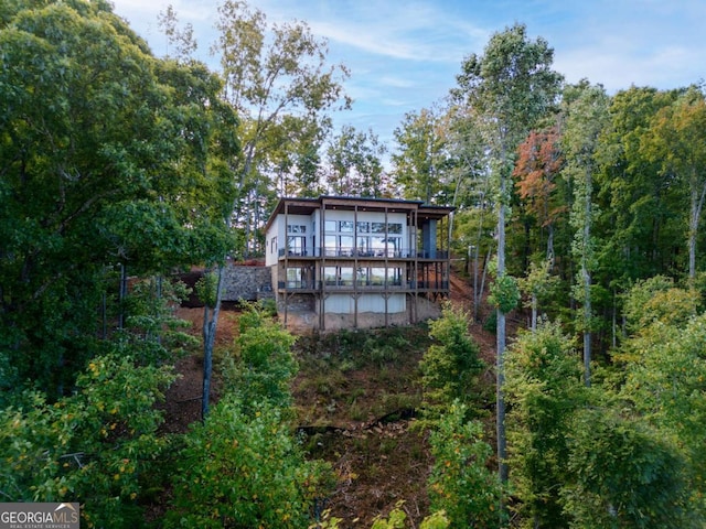 714 Scouts Overlook, Morganton, GA 30560 - rear view of property featuring a forest view and a wooden deck