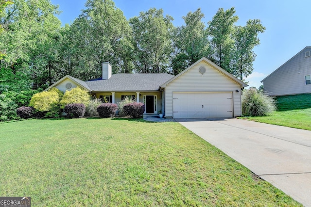 ranch-style house featuring an attached garage, a chimney, driveway, and a front yard