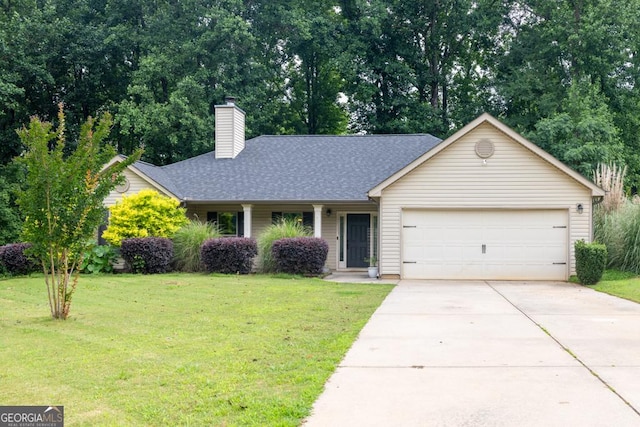 1553 Shoal Creek Dr, Winder, GA 30680 - ranch-style house featuring an attached garage, driveway, a front lawn, and a chimney