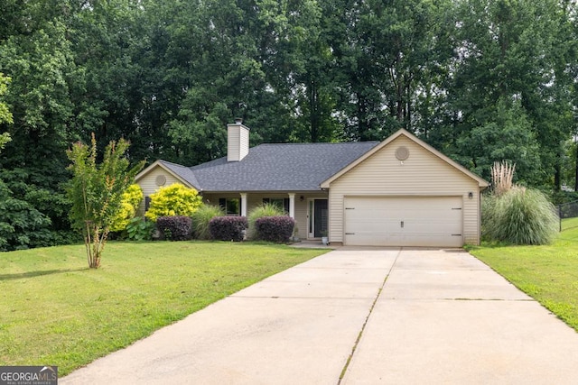 1553 Shoal Creek Dr, Winder, GA 30680 - ranch-style house featuring a garage, concrete driveway, a front yard, and a chimney