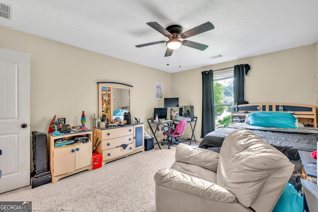1553 Shoal Creek Dr, Winder, GA 30680 - carpeted bedroom with a textured ceiling and a ceiling fan