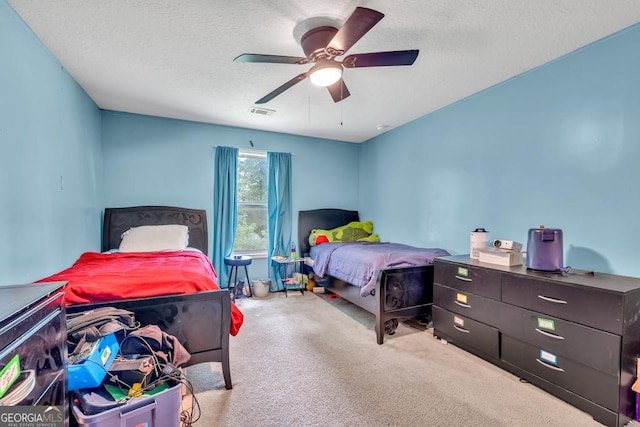 1553 Shoal Creek Dr, Winder, GA 30680 - bedroom featuring carpet, a textured ceiling, and ceiling fan
