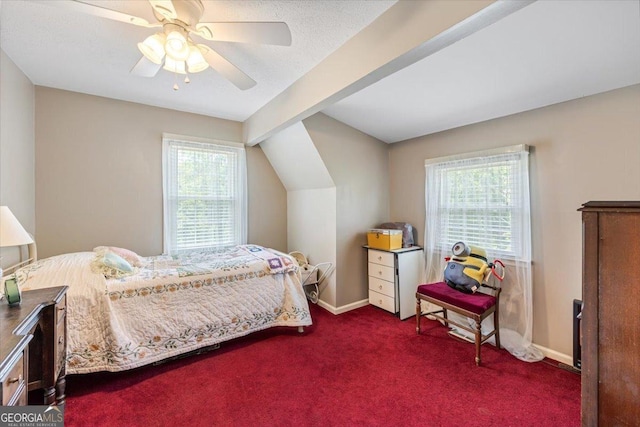 540 Commanche Dr, Macon, GA 31210 - bedroom with ceiling fan, lofted ceiling, baseboards, and dark carpet