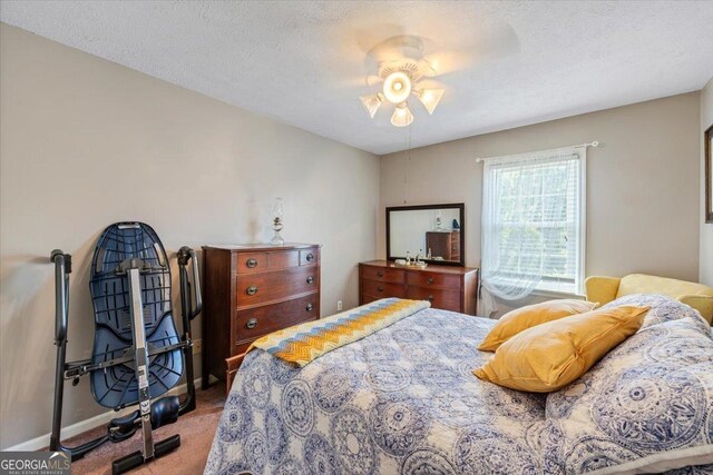 540 Commanche Dr, Macon, GA 31210 - carpeted bedroom with a ceiling fan