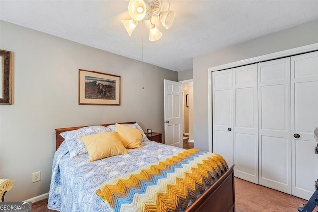 540 Commanche Dr, Macon, GA 31210 - carpeted bedroom featuring baseboards, a closet, and ceiling fan