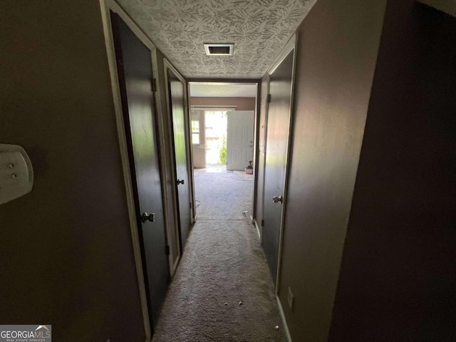 2572 Stratford Ln, Morrow, GA 30260 - hall with carpet flooring and an ornate ceiling