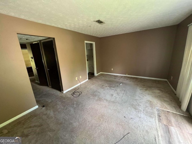 2572 Stratford Ln, Morrow, GA 30260 - unfurnished bedroom with baseboards, carpet flooring, and visible vents