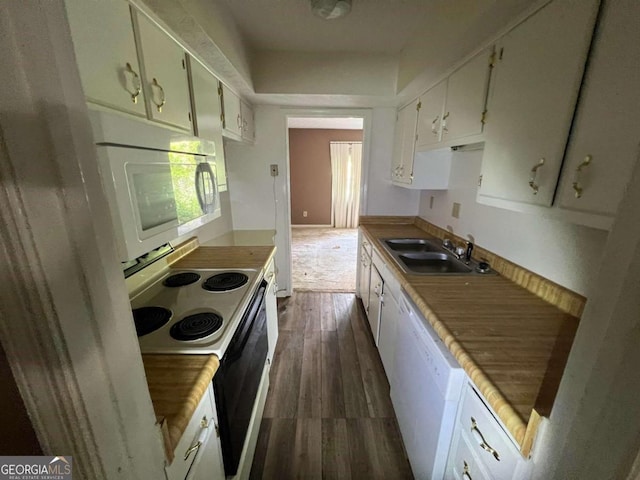 2572 Stratford Ln, Morrow, GA 30260 - kitchen featuring white dishwasher, a sink, white cabinetry, range with electric stovetop, and dark wood-style floors