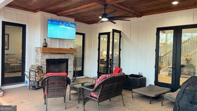 338 Grady St, Waleska, GA 30183 - view of patio featuring french doors, a ceiling fan, and an outdoor living space with a fireplace