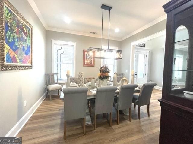 338 Grady St, Waleska, GA 30183 - dining room with wood finished floors and crown molding