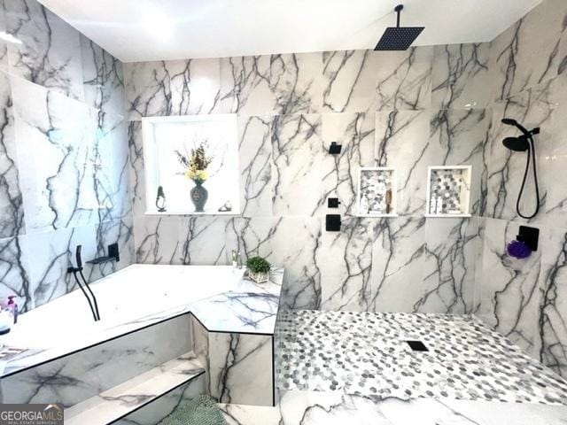 338 Grady St, Waleska, GA 30183 - bathroom with stone wall, a garden tub, and a marble finish shower