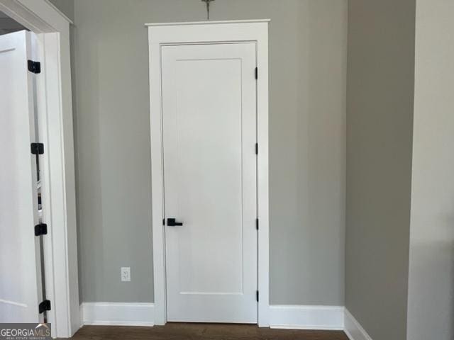 338 Grady St, Waleska, GA 30183 - hallway with baseboards and dark wood-type flooring