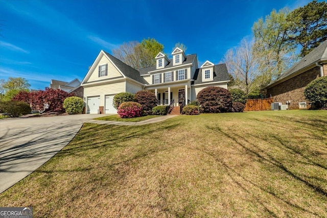 261 Providence Blvd, Macon, GA 31210 - traditional-style house featuring fence, a garage, concrete driveway, a porch, and a front lawn