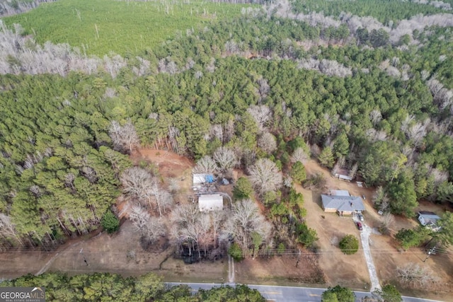 aerial view with a wooded view