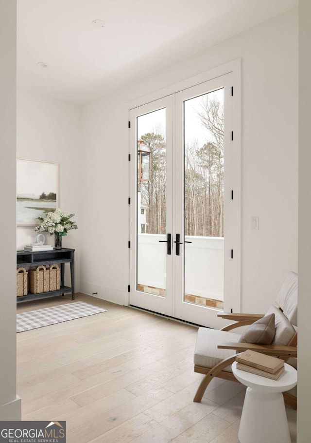 11536 Serenbe Ln, Chattahoochee Hills, GA 30268 - doorway featuring french doors and wood finished floors