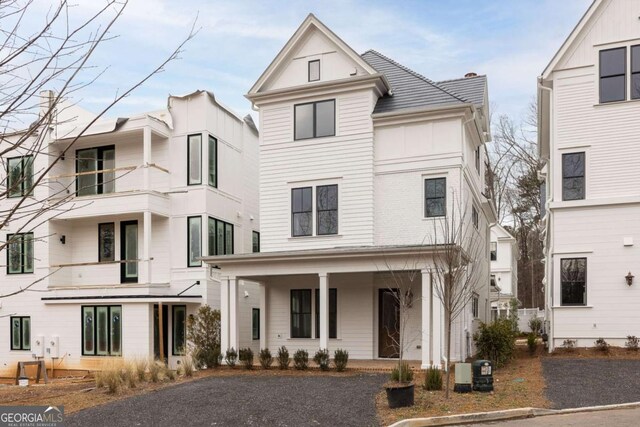 11536 Serenbe Ln, Chattahoochee Hills, GA 30268 - view of front of house featuring covered porch and central air condition unit