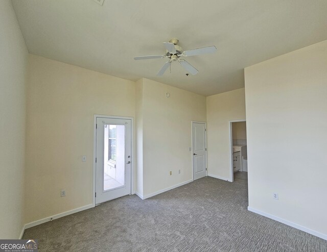 870 Mayson Turner Rd NW Unit 1447, Atlanta, GA 30314 - carpeted spare room featuring a ceiling fan and baseboards