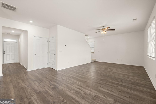 unfurnished living room featuring a ceiling fan, recessed lighting, visible vents, and dark wood-type flooring