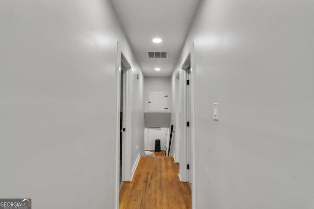 3819 Shane Ct, Ellenwood, GA 30294 - corridor featuring light wood-style floors, visible vents, baseboards, and recessed lighting