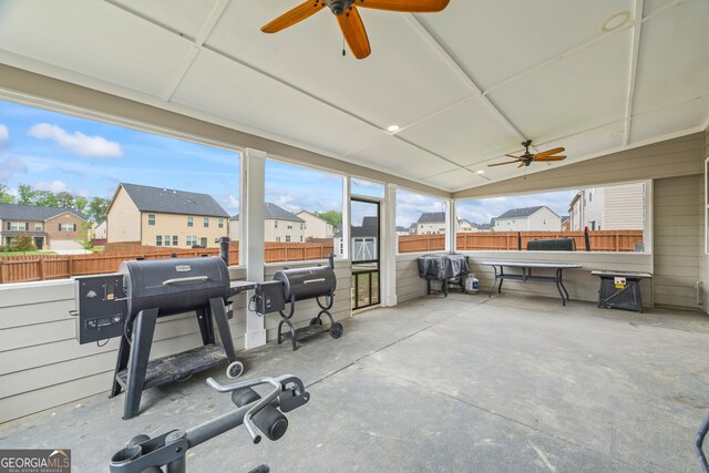 548 Azalea Bloom Dr E, Loganville, GA 30052 - view of patio / terrace with ceiling fan, a fenced backyard, and a residential view