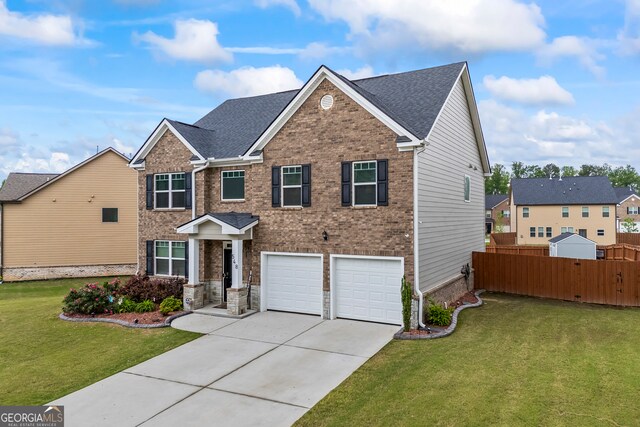 548 Azalea Bloom Dr E, Loganville, GA 30052 - view of front of house featuring concrete driveway, an attached garage, brick siding, and roof with shingles