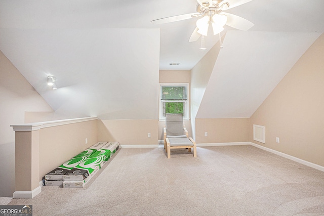 game room featuring a ceiling fan, carpet, baseboards, and lofted ceiling