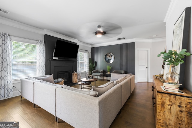 150 Gadson Dr, Fayetteville, GA 30214 - living area with plenty of natural light, visible vents, ceiling fan, a glass covered fireplace, and ornamental molding