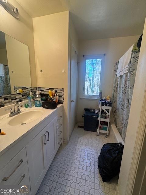 185 Windhaven Trl SW, Atlanta, GA 30331 - full bathroom with vanity, tile patterned floors, and decorative backsplash