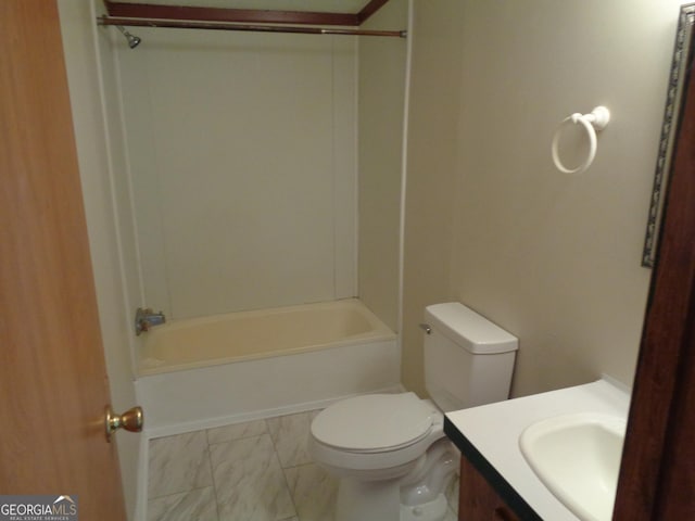 bathroom with toilet, bathing tub / shower combination, marble finish floor, and vanity