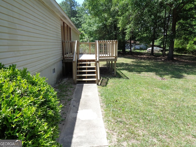 view of yard with stairway and a wooden deck