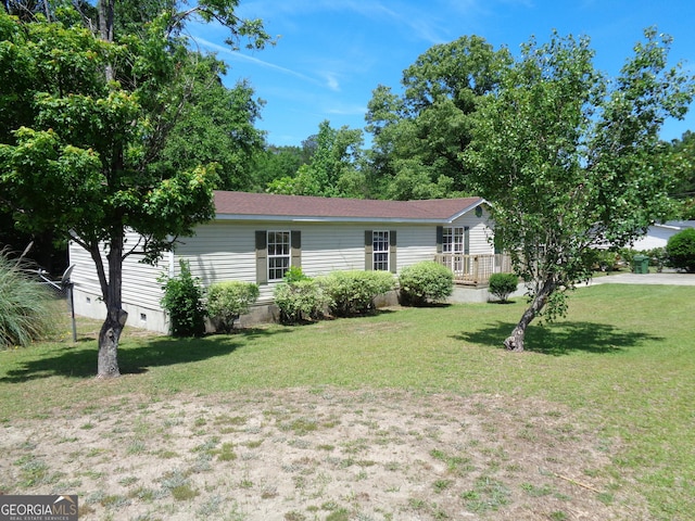view of front facade featuring a front lawn and crawl space