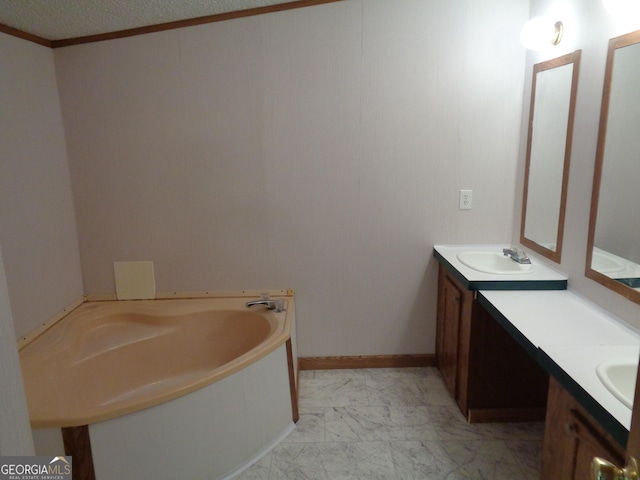 full bath with double vanity, a sink, a bath, marble finish floor, and ornamental molding