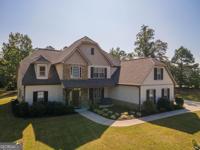 50 Brook Trl, Newnan, GA 30265 - craftsman-style home featuring stone siding, roof with shingles, and a front yard