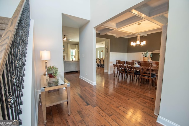 50 Brook Trl, Newnan, GA 30265 - foyer featuring coffered ceiling, ceiling fan with notable chandelier, wood-type flooring, and beamed ceiling