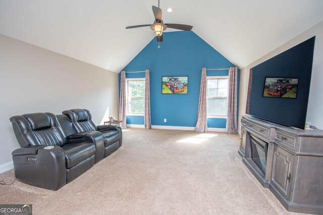 50 Brook Trl, Newnan, GA 30265 - living room featuring vaulted ceiling, light carpet, baseboards, and a ceiling fan