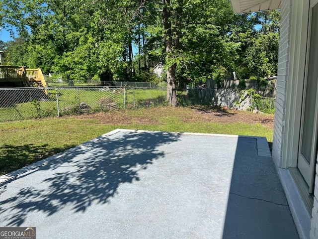 view of patio with fence