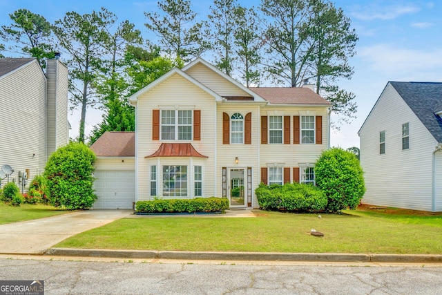 3550 Willow Tree Trce, Decatur, GA 30034 - view of front of house featuring a front lawn, an attached garage, and concrete driveway
