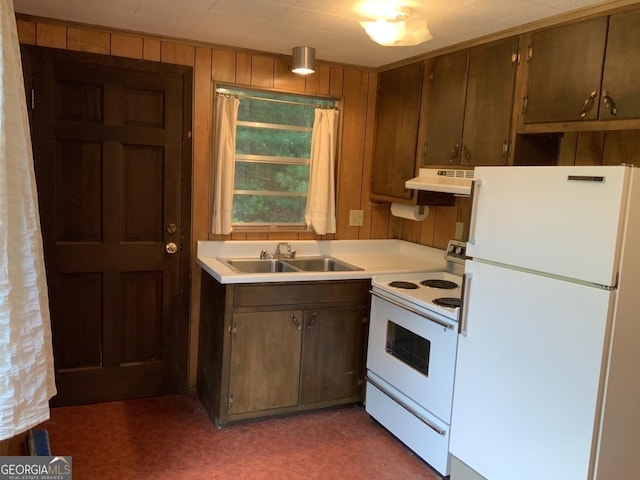 277 Hamilton Rd, Blairsville, GA 30512 - kitchen featuring white appliances, a sink, wooden walls, ventilation hood, and light countertops
