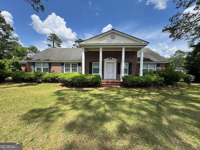 1101 Tallahassee Rd, Bainbridge, GA 39819 - greek revival house featuring brick siding and a front yard