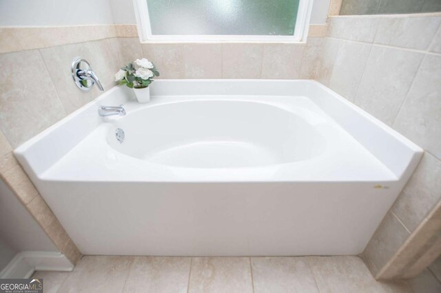 bathroom featuring a bath