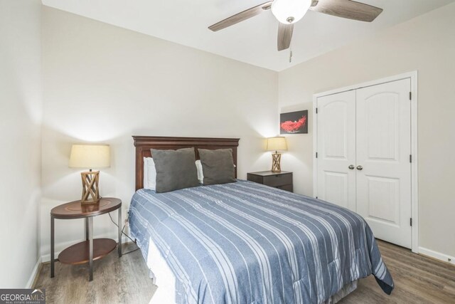 632 Creek Pointe Dr, Athens, GA 30606 - bedroom featuring wood finished floors, baseboards, a closet, and a ceiling fan