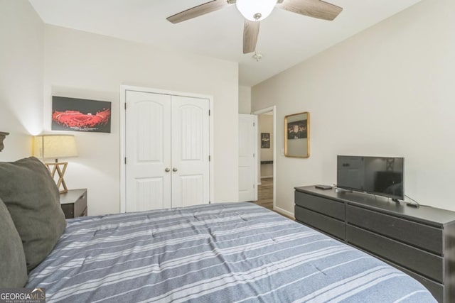 bedroom featuring a closet and a ceiling fan
