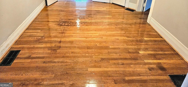 detailed view of wood finished floors and baseboards
