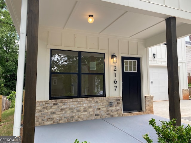 2167 Main St NW, Atlanta, GA 30318 - view of exterior entry featuring board and batten siding