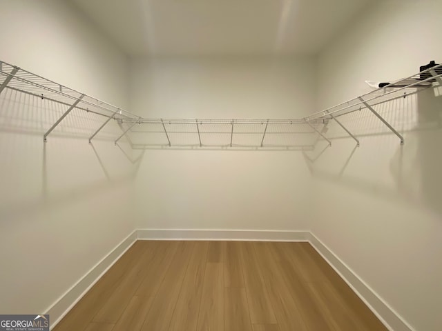 2167 Main St NW, Atlanta, GA 30318 - walk in closet with wood finished floors