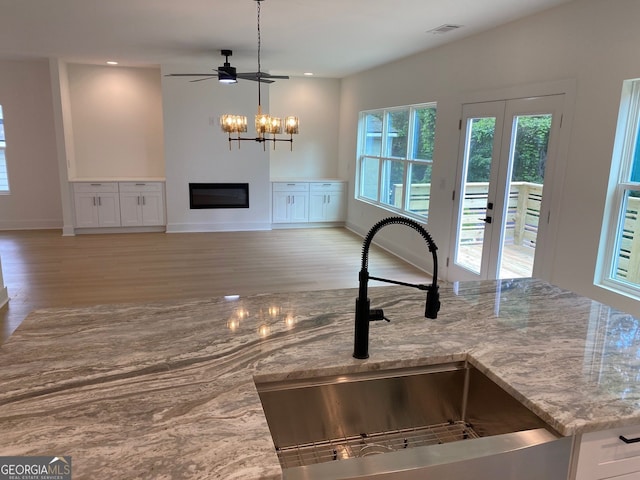 2167 Main St NW, Atlanta, GA 30318 - kitchen featuring a notable chandelier, visible vents, a sink, and wood finished floors