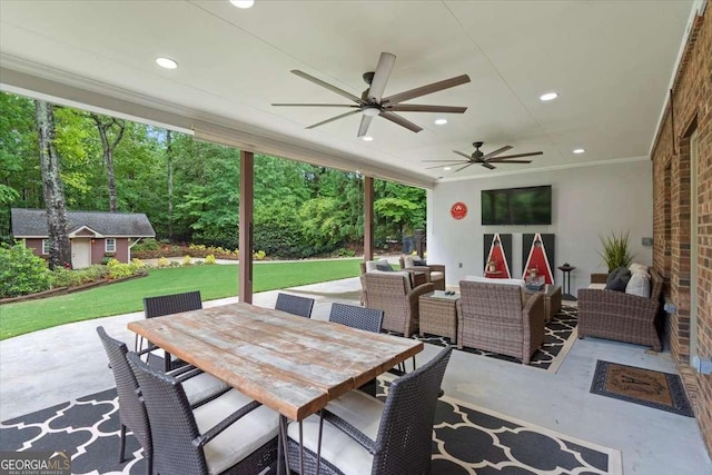 view of patio / terrace with an outdoor hangout area, ceiling fan, and outdoor dining space