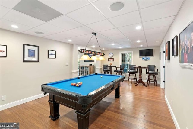 game room with wood finished floors, pool table, baseboards, a drop ceiling, and recessed lighting