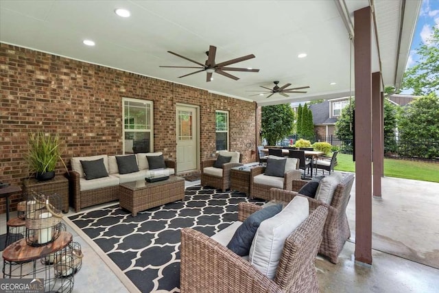 view of patio / terrace featuring an outdoor hangout area, ceiling fan, outdoor dining area, and fence