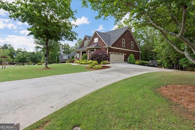 craftsman house featuring concrete driveway, an attached garage, and a front yard